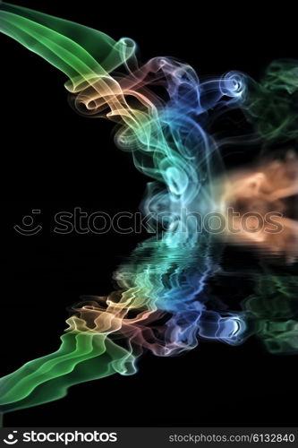 smoke from a cigarrette detail in black background