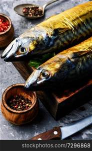 Smoked fish on kitchen board.Smoked mackerel.Mediterranean food. Smoked fish mackerel
