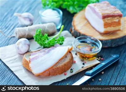 smoked lard with bread with aroma spice