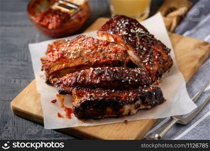 Smoked Roasted pork ribs. Barbeque spicy ribs. Traditional american BBQ food.