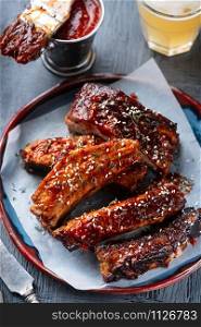 Smoked Roasted pork ribs. Barbeque spicy ribs. Traditional american BBQ food. Top view.