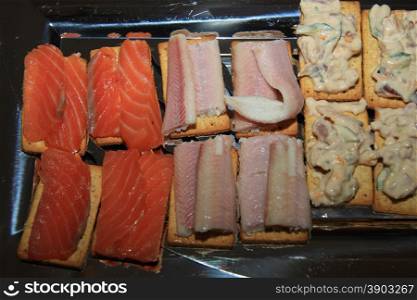 Smoked salmon and smoked eel on toast