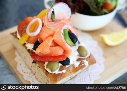 Smoked salmon on toast with salad vegetable 