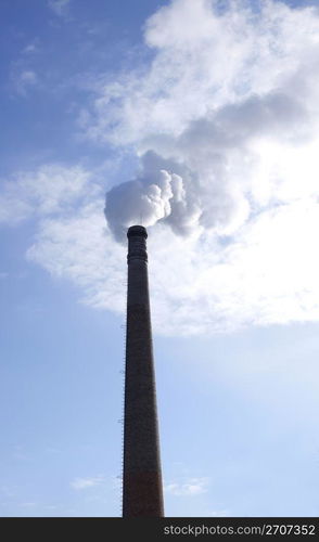 Smoking chimney stack. Photo taken at March, 2010