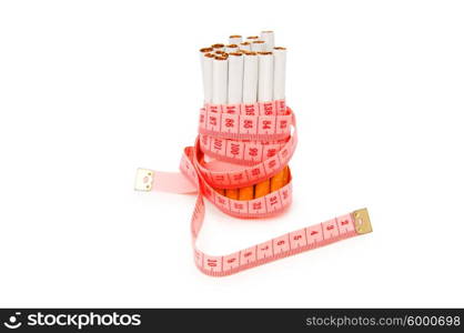 Smoking concept with measuring tape and cigarettes