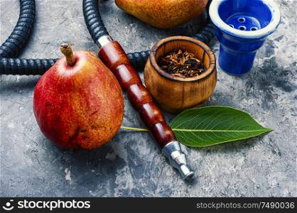 Smoking hookah.Details of Turkish hooka.Shisha with a fruity aroma of tobacco.. Oriental smoking hookah