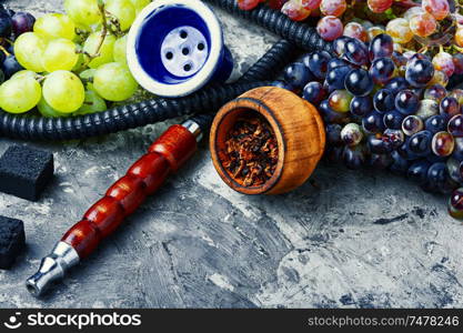 Smoking hookah.Details of Turkish kalian.Shisha with a fruity aroma of tobacco.. Oriental smoking hookah