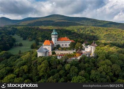 Smolenice, Slovakia - 26 September, 2022: view of Smolenice Castle in the Little Carpathians in green late summer forest