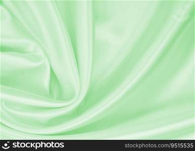 Smooth e≤gant green silk or satin luxury cloth texture can use as abstract background. Luxurious background design 