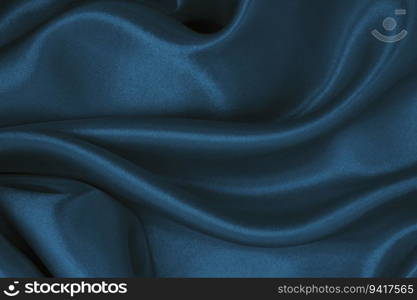 Smooth elegant blue silk or satin luxury cloth texture can use as abstract background. Luxurious background design  