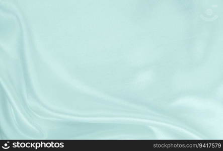 Smooth elegant blue silk or satin luxury cloth texture can use as abstract background. Luxurious background design