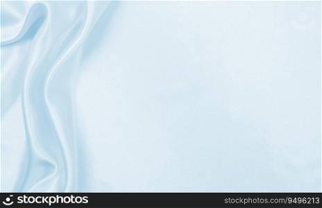 Smooth elegant blue silk or satin luxury cloth texture can use as abstract background. Luxurious background design
