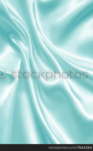 Smooth elegant blue silk or satin texture can use as background