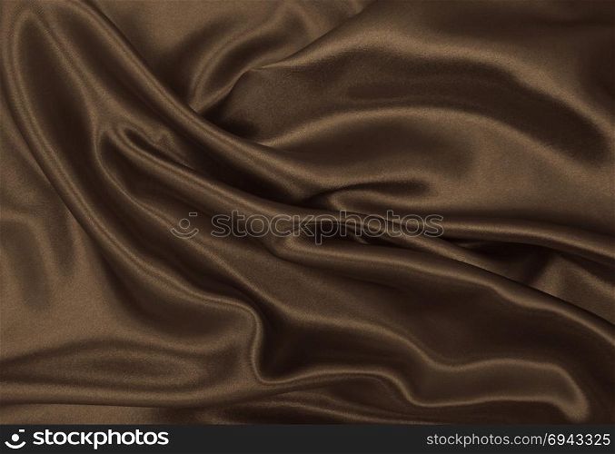 Smooth elegant brown silk or satin texture can use as abstract background. Luxurious background design. In Sepia toned. Retro style