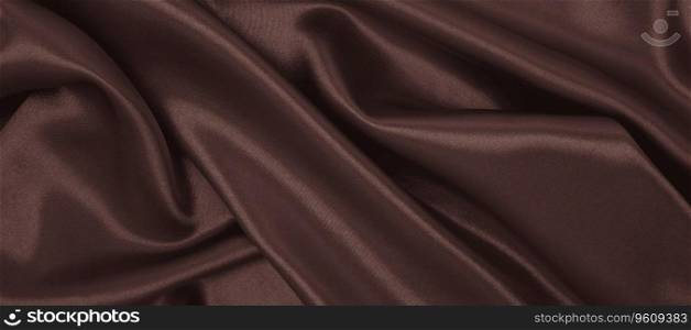 Smooth elegant dark brown silk or satin luxury cloth texture can use as abstract background. Luxurious background design. In Sepia toned. Retro style