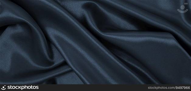 Smooth elegant dark grey silk or satin luxury cloth texture can use as abstract background. Luxurious background design