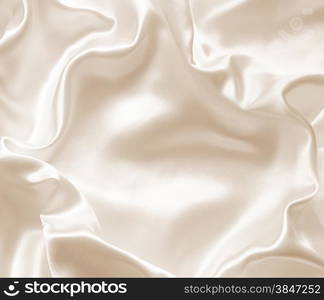 Smooth elegant golden silk can use as wedding background. In Sepia toned. Retro style