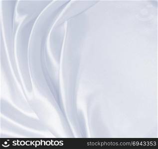 Smooth elegant grey silk or satin luxury cloth can use as wedding background. Luxurious Christmas background or New Year background design