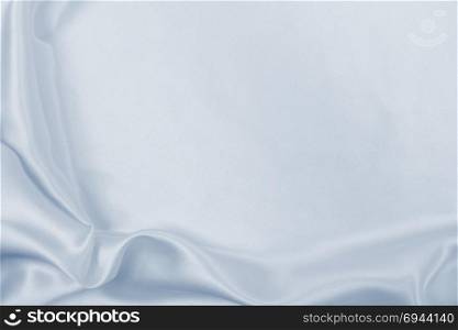 Smooth elegant grey silk or satin luxury cloth can use as wedding background. Luxurious Christmas background or New Year background design