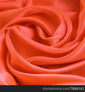 Smooth elegant orange silk or satin can use as background