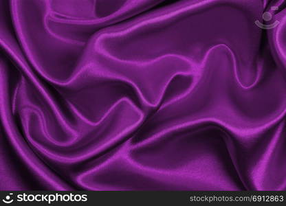 Smooth elegant pink silk or satin luxury cloth texture can use as abstract background. Luxurious background design