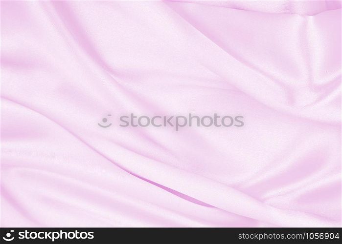 Smooth elegant pink silk or satin texture can use as wedding background. Luxurious background design