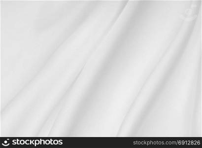 Smooth elegant white silk or satin luxury cloth texture can use as wedding background. Luxurious background design