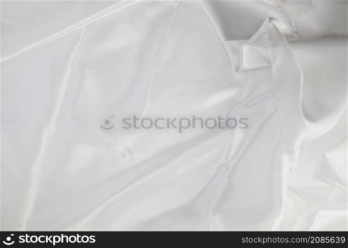 Smooth elegant white silk romantic background texture. In Sepia toned. Retro soft colored natural style