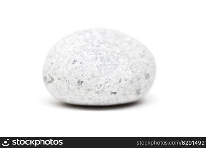 Smooth gray stone isolated on a white background with shadow