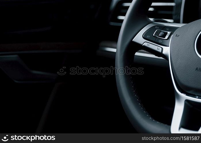 Smooth material. Close up view of interior of brand new modern luxury automobile.. Smooth material. Close up view of interior of brand new modern luxury automobile