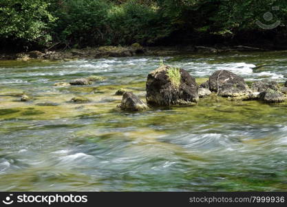 Smooth water in river Doubs in Switzerland