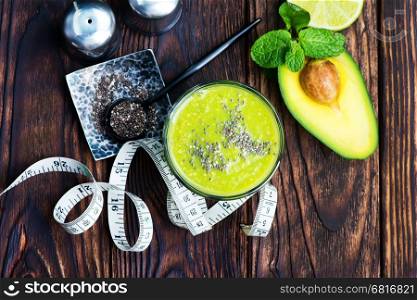 smoothie from avocado with chia seeds in the glass
