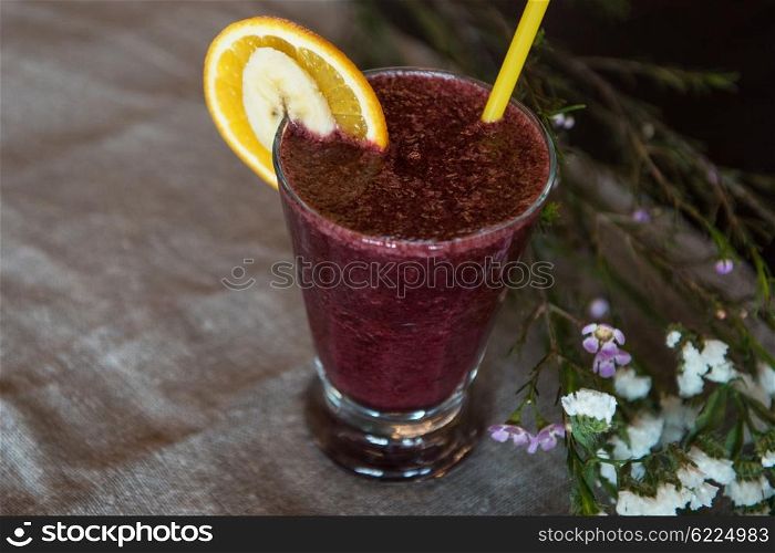 smoothie from blueberry banana and orange juice. Fresh fruit smoothie from blueberry banana and orange juice