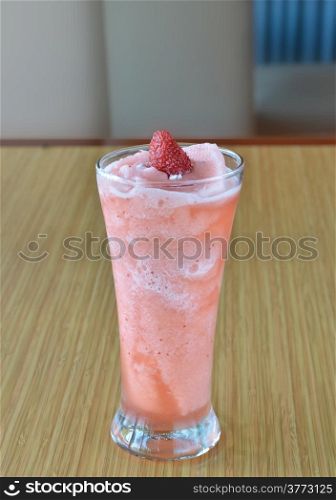 Smoothie strawberry served with fresh strawberry