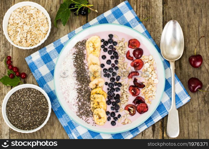 Smoothie with Blueberries, Chia Seeds on Brown Boards Studio Photo. Smoothie with Blueberries, Chia Seeds on Brown Boards