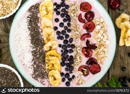Smoothie with Blueberries, Chia Seeds on Brown Boards Studio Photo. Smoothie with Blueberries, Chia Seeds on Brown Boards
