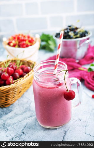 smoothie with fresh berries on a table