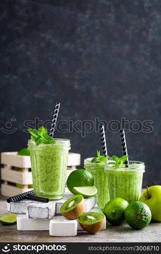 Smoothie with fresh green apple, kiwi and lime. Summer vitamin refreshing beverage. Healthy detox diet