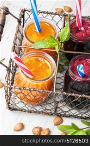 Smoothies with apricot and currant. homemade smoothies with ripe apricot and currant berries