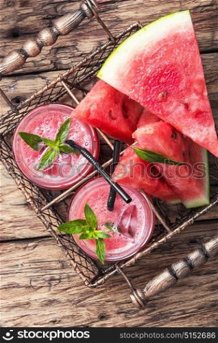 Smoothies with watermelon. summer watermelon fresh smoothie in glass jars