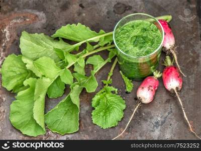 Smoothy of fresh green radish leaves. Vegetable. Food ingredients. Detox concept