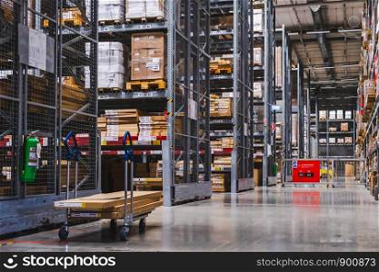 Smut Prakan ,Thailand - August 01,2019 : A cart in warehouse aisle in an IKEA store. IKEA is the world's largest furniture retailer.