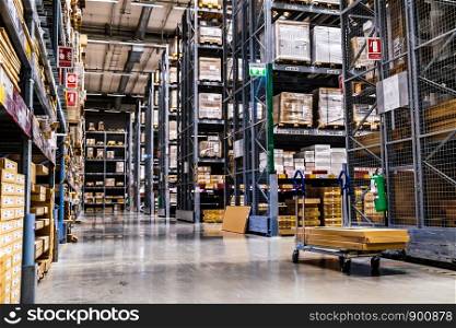 Smut Prakan ,Thailand - August 01,2019 : A cart in warehouse aisle in an IKEA store. IKEA is the world's largest furniture retailer.