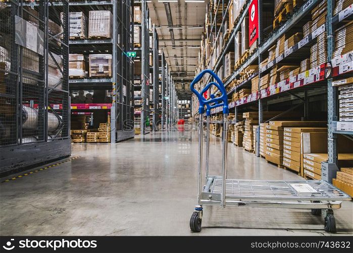 Smut Prakan ,Thailand - May 17,2018 : A cart in warehouse aisle in an IKEA store. IKEA is the world's largest furniture retailer.