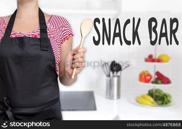 snack bar cook holding wooden spoon concept background. snack bar cook holding wooden spoon concept background.