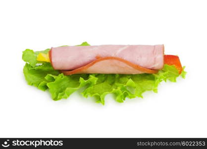 Snack made of ham and lettuce on white