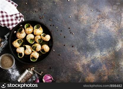 Snails baked with sauce, Baked snails with butter and spice