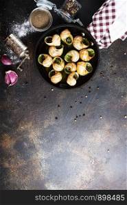 Snails baked with sauce, Baked snails with butter and spice