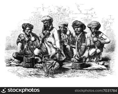Snake charmers of India. - Drawing Sellier, vintage engraved illustration. Magasin Pittoresque 1875.
