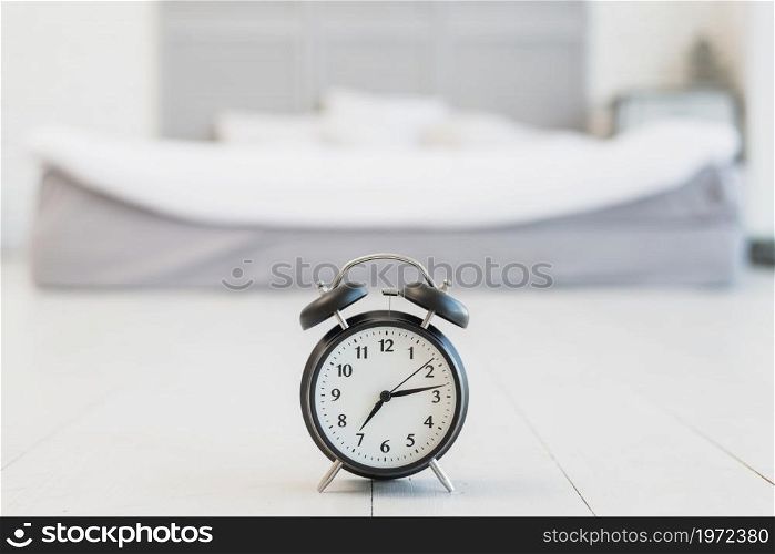 snooze floor near bed with white linen. High resolution photo. snooze floor near bed with white linen. High quality photo